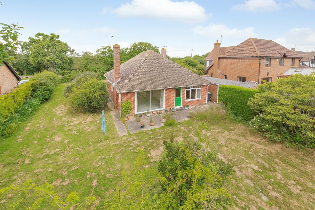 Lot: 123 - BUNGALOW FOR REPAIR IN DESIRABLE LOCATION WITH POTENTIAL FOR REDEVELOPMENT - Rear of detached bungalow